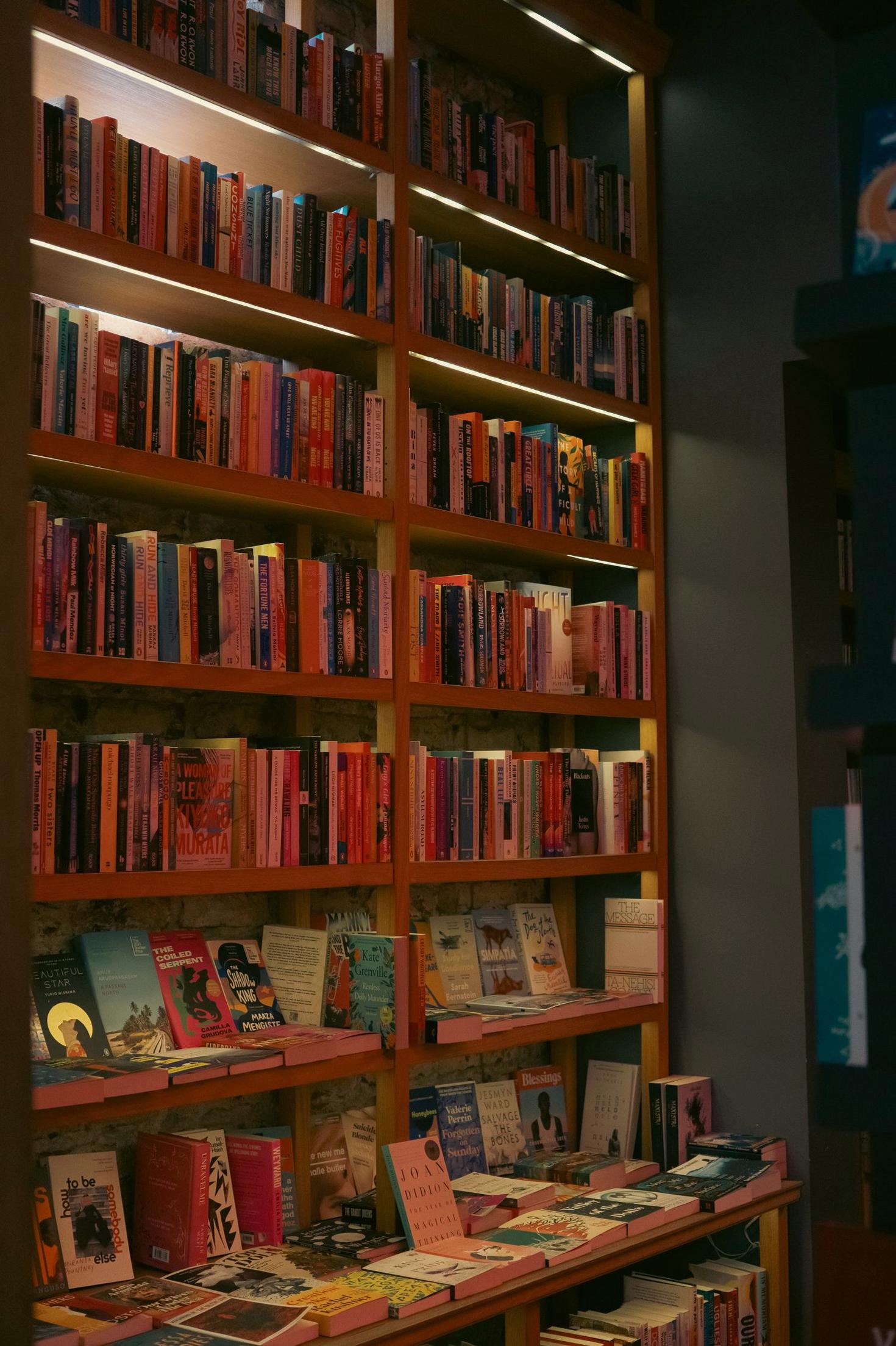 Evermont bookstore interior with warm wooden shelves and curated book displays
